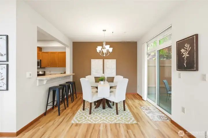 Dining room with slider to private patio.