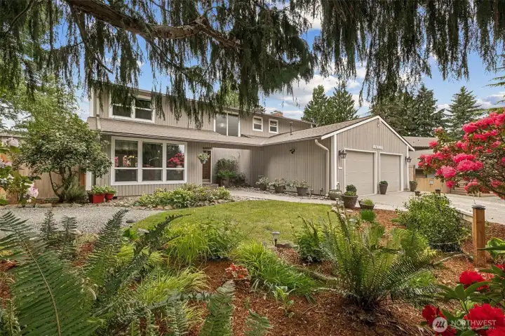 — from the beautifully mature landscaping and towering trees to the thoughtfully inviting spaces inside and out!
