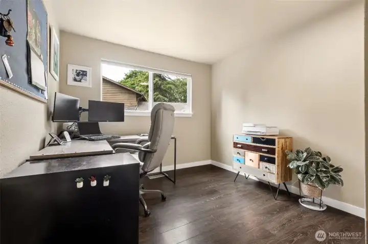 Bedroom #1 is on the main floor - perfect for guests, an exercise space or dedicated office!