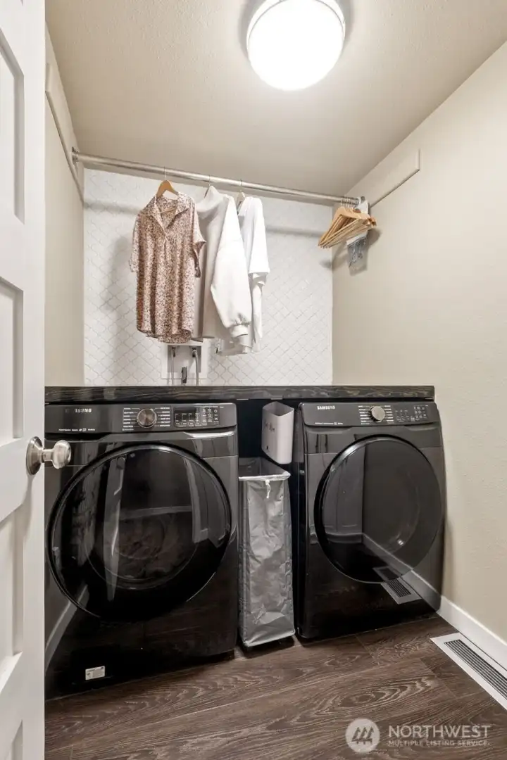 The newer washer & dryer STAY - and you will appreciate the special "bowling alley" countertop!