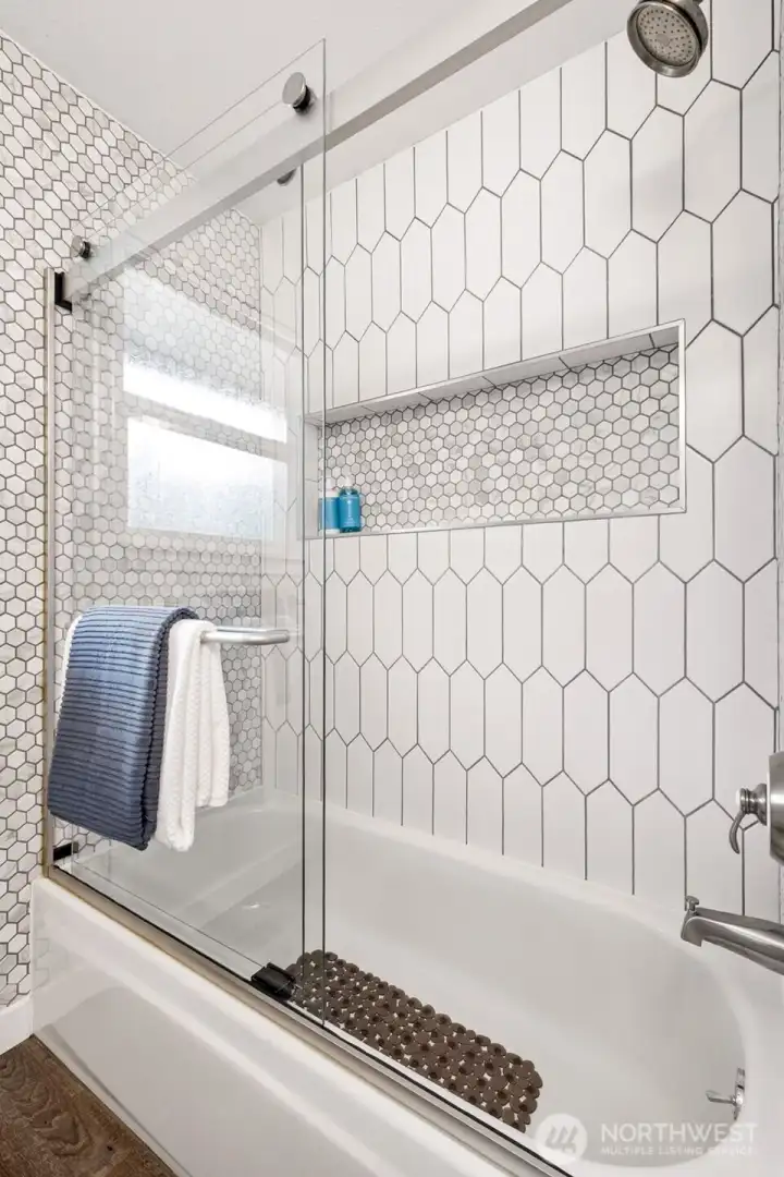 Plus unique sliding glass shower door!