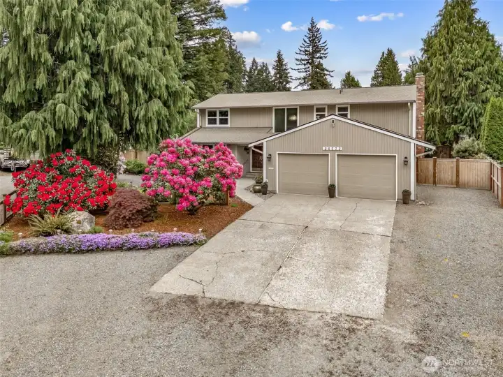 Welcome all your friends & guests with so much off-street parking! (With no HOA, there is room for RV parking to the right!)