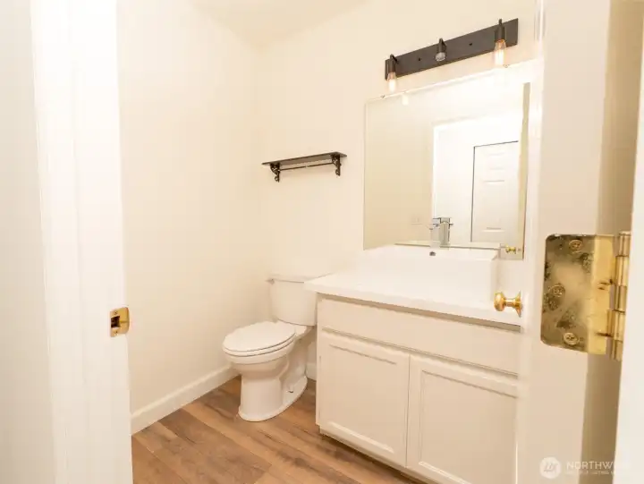 Powder room with Brand New Quartz Counter-top, new modern sink, new Faucet Powder room with Brand New Quartz Counter-top, new modern sink, new Faucet