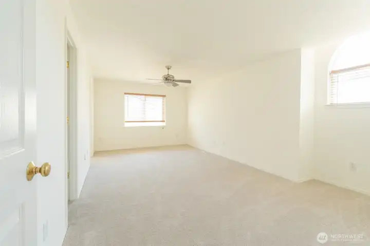 Master Bedroom with walk-in Closet and Ceiling Fan Master Bedroom with walk-in Closet and Ceiling Fan