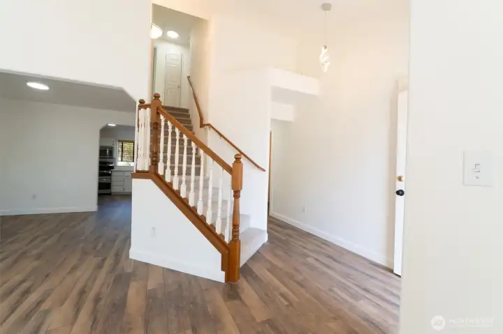 Entrance with a cute modern light fixture Entrance with a cute modern light fixture