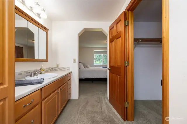 3/4 bath off the primary bedroom with 2 walk-in closets on the main level.