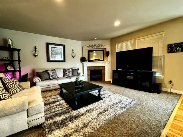 Great room with a natural gas fireplace.