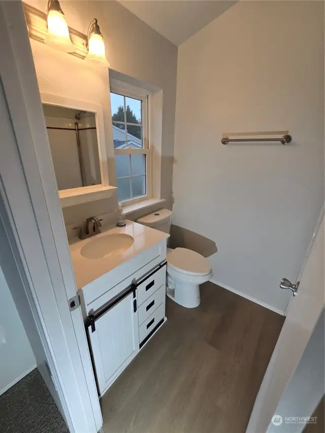 Newly romodeled bathroom with new vanity as well