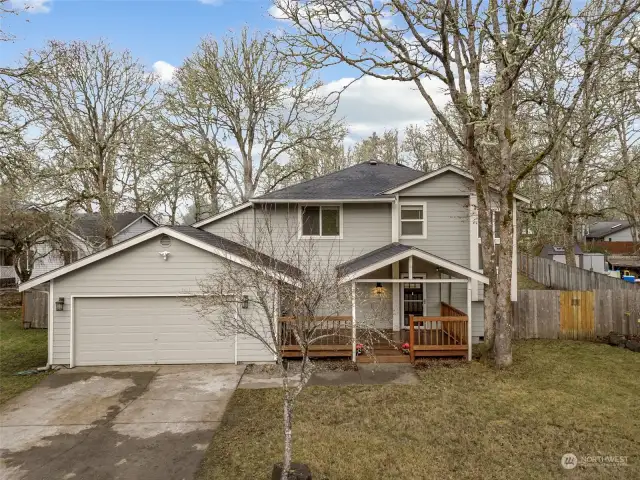 Picture this: soft gray hues, a porch built for lazy mornings, and mature oaks giving you just the right amount of shade and mystery. Add a level driveway and a two-car garage, and you’ve got the trifecta of charm, style, and practicality located in The Seasons neighborhood, just minutes from I-5.