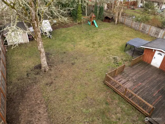 Backyards that multitask: a shed for all your storage needs, a spot for your RV (hidden neatly behind the fence, of course), and even a playground toy to keep the little ones entertained. It’s functional fun with HOA-approved flair.