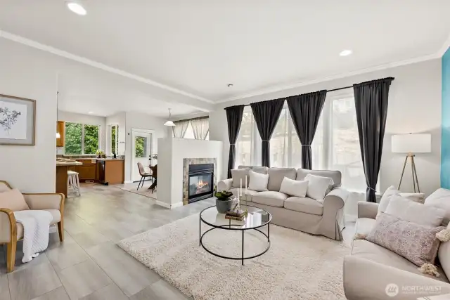 A dual sided fireplace brings warmth and ambiance to the main level.