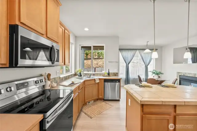 Warm finishes, ample cabinetry and smart storage space will keep your kitchen organized.