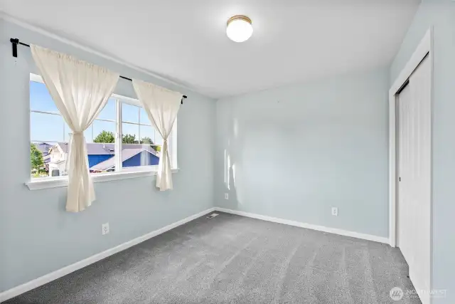 One of three bedrooms on upper level.