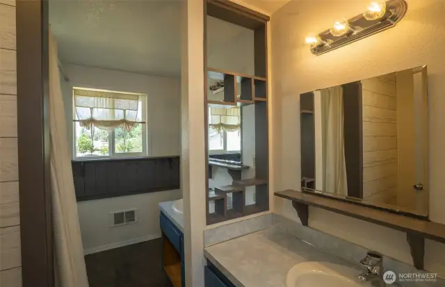 Full bath with double sinks