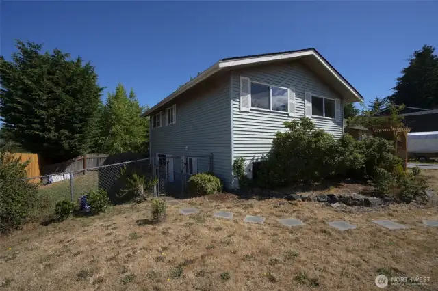 Separate entrance to studio apartment west side of house