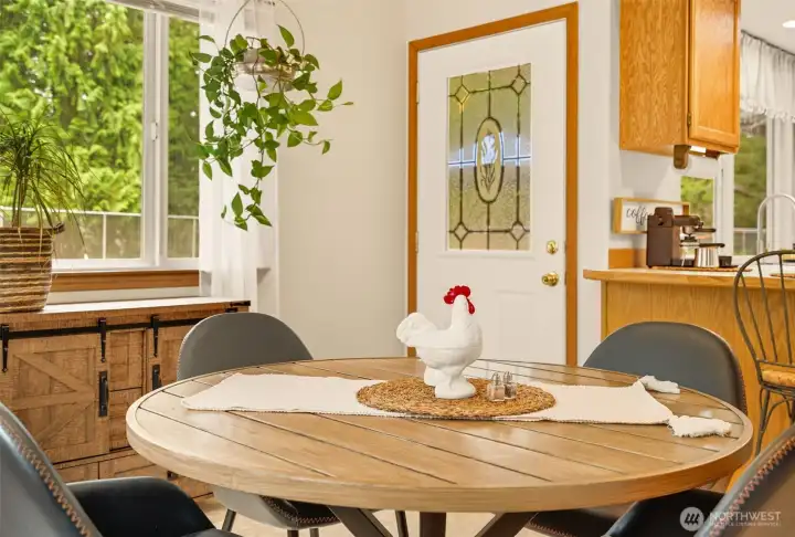Escape from the hub of the home to the expansive patio and private back yard.