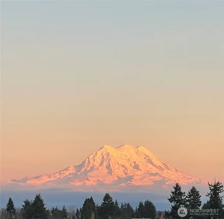 Watch sunsets over the mountain from your backyard (this was taken from the back patio