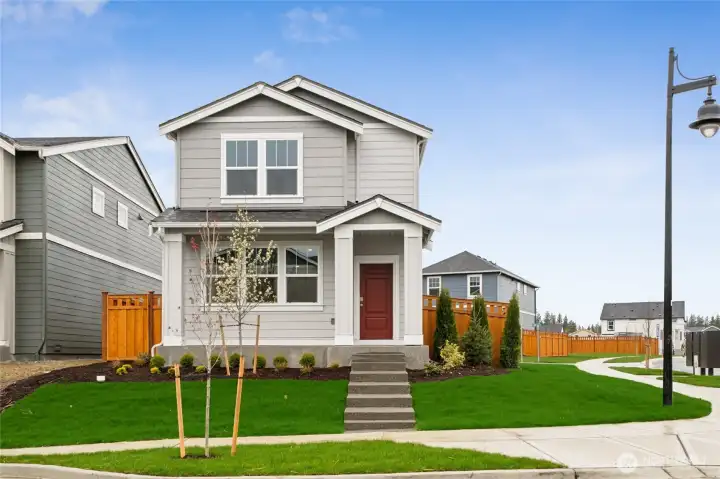 The Piper’s inviting curb appeal and charming covered entry set the tone for comfortable, modern living.  Pictures are for representational purposes only, colors and features may vary.