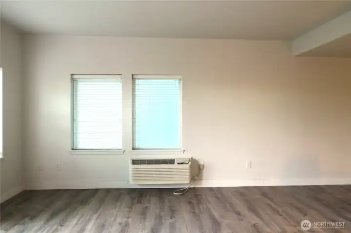 YOUR LIVING ROOM HAS EASY CARE VINYL FLOORING!