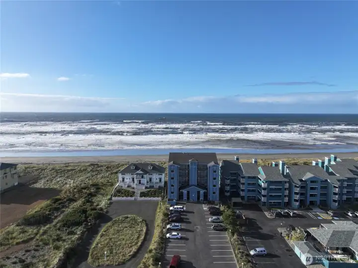 AERIAL VIEW OF OCEAN CREST CONDO BUILDING, PARKING LOT AND THE PACIFIC OCEAN!