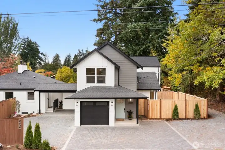 A gorgeous new construction craftsman style condo in the picturesque Haller Lake community.