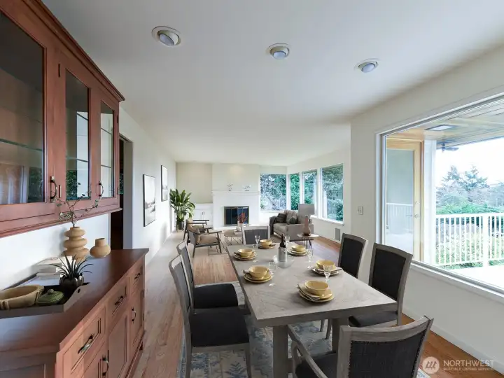Dining room/living room, virtually staged.