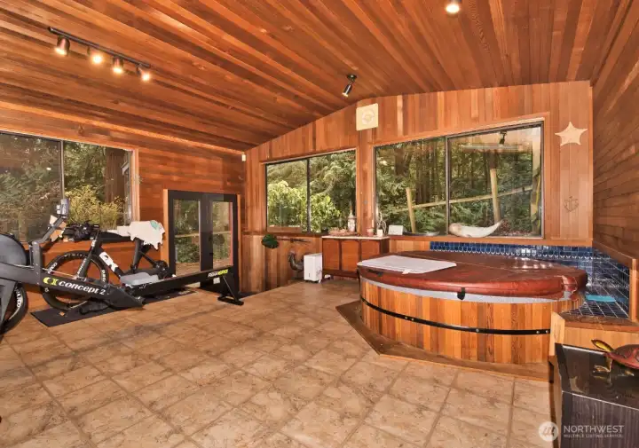 Enclosed hot tub and exercise room -- adds an additional 320 sq ft.
