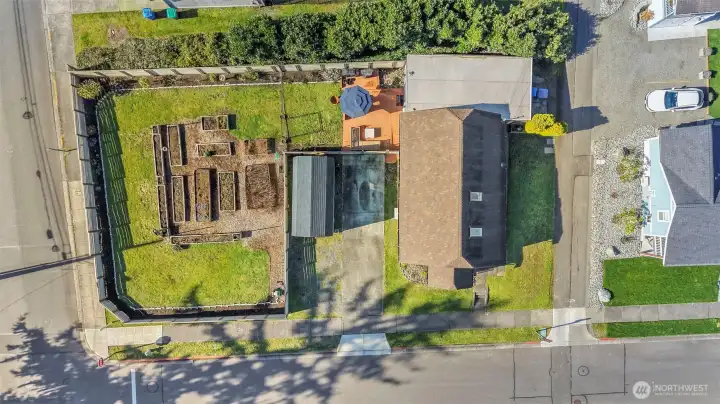 Birds eye view of property - Corner lot on N Winnifred St and N 49th St. Alley way is Rust Way.