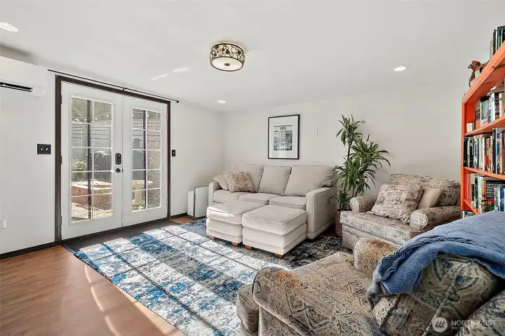 Family room leads out to the yard through the French doors.