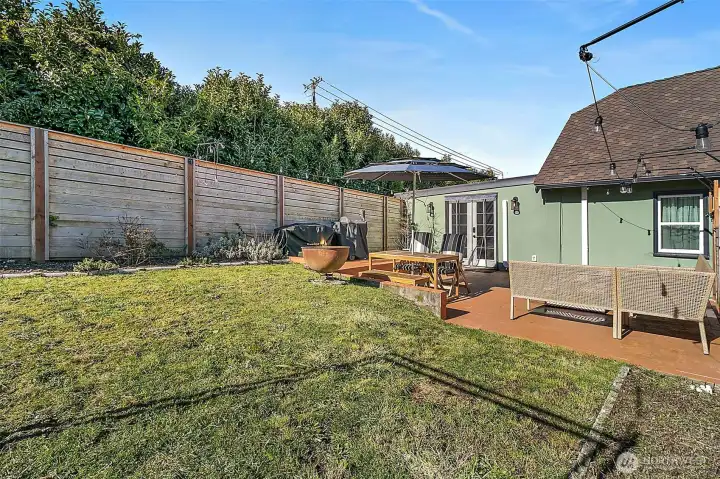 French doors off family room in the back extension of the home.