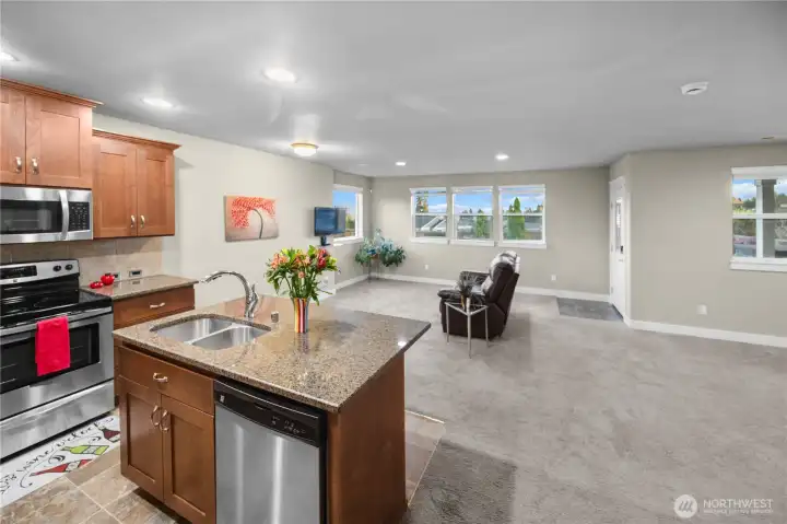 Apartment kitchen/living room. Has its own laundry and heating/cooling.