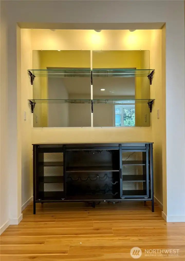 This is the side bar w/ mirrored backing & glass shelves for wine glass.