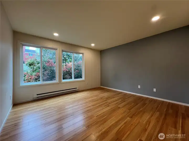 This is the primary bedroom w/ windows.