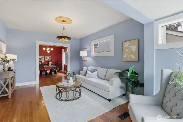 Another view of the living room and the gleaming ALL NEW hardwood flooring!