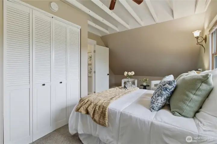 Another view of the primary bedroom... notice the large closet for an older craftsman home!