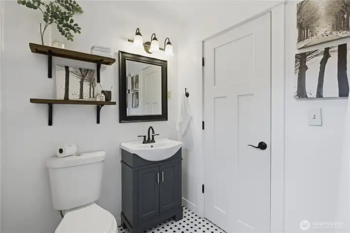 Completely gutted and remodeled upstairs main bathroom. This has been all replumbed, and accented with all craftsman style workmanship! Notice the tile flooring.