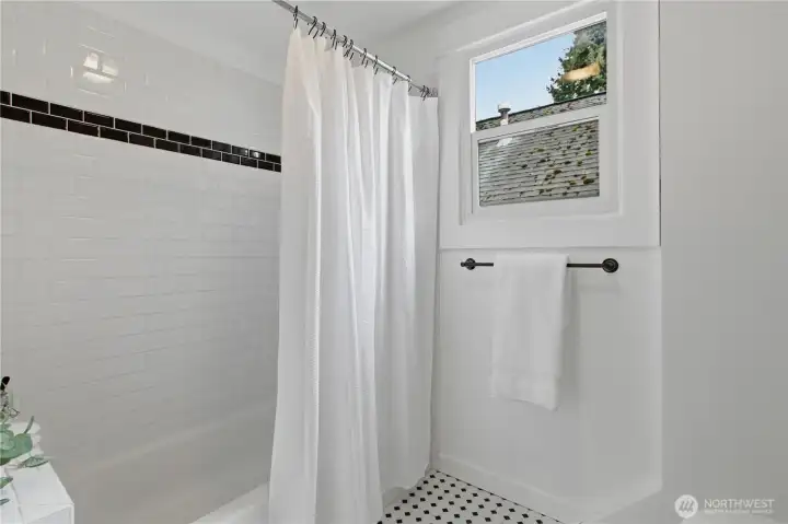 Gorgeous subway tile new tub and shower surround... so nice!
