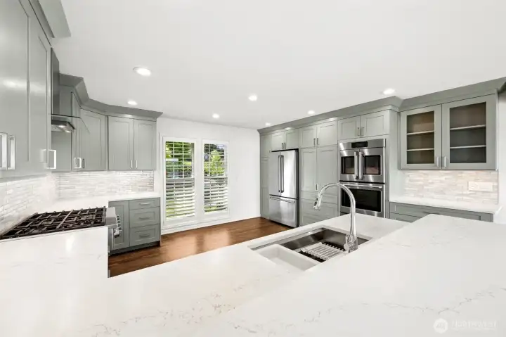 You won't tire of doing dishes as you look out the kitchen windows at the peacefulness and beauty of this quiet tranquil setting. Of course, you can always load the dishwasher and join in the fun with your guests!