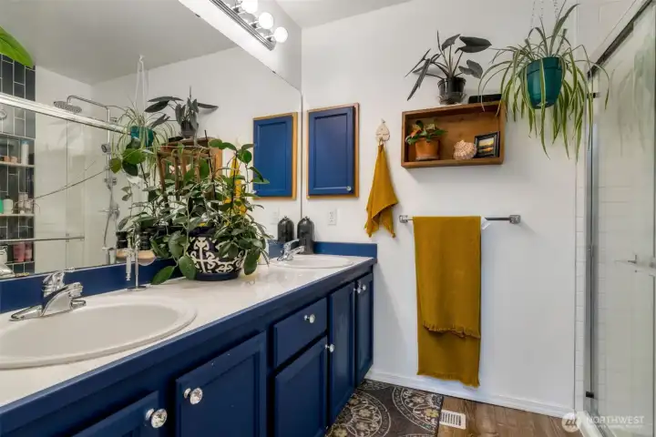 Remodeled in 2021, the primary shower features luxury fixtures and a tiled waterfall for a relaxing, elevated feel you'll love coming home to!