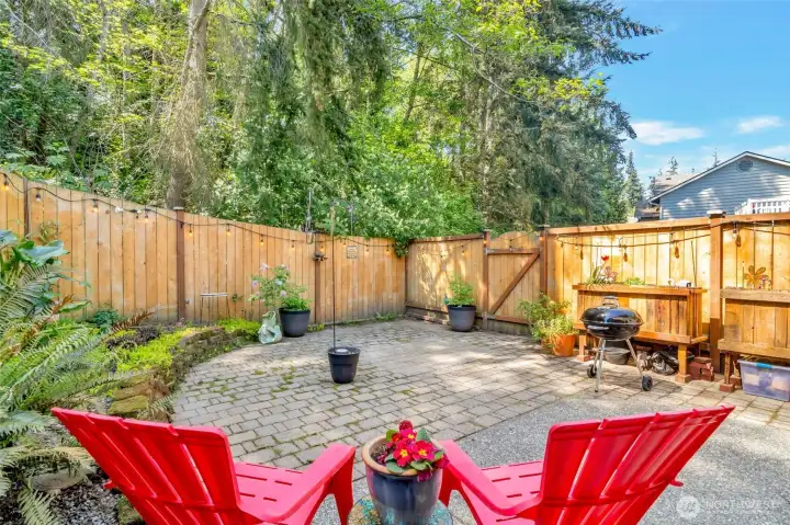 Full of mature landscaping and annual flowers, this working garden is a work of art!