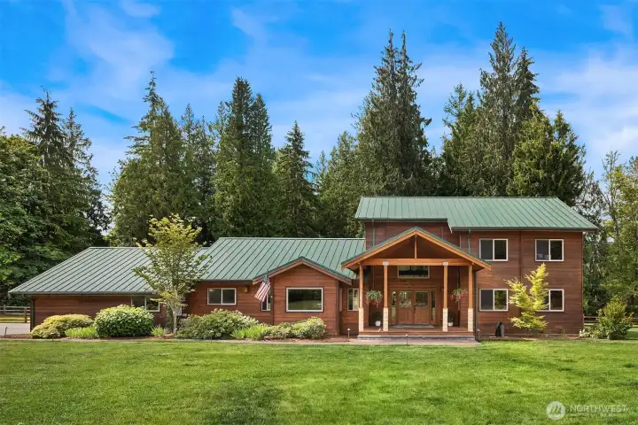 Welcome to this custom cedar-built home tucked away in the heart of Redmond on 7 private acres.