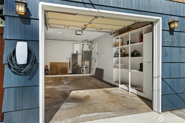 Garage with ample storage and Level 2 EV charger