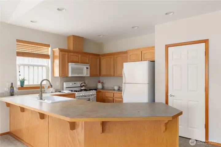 All appliances included. Door is to sizeable pantry