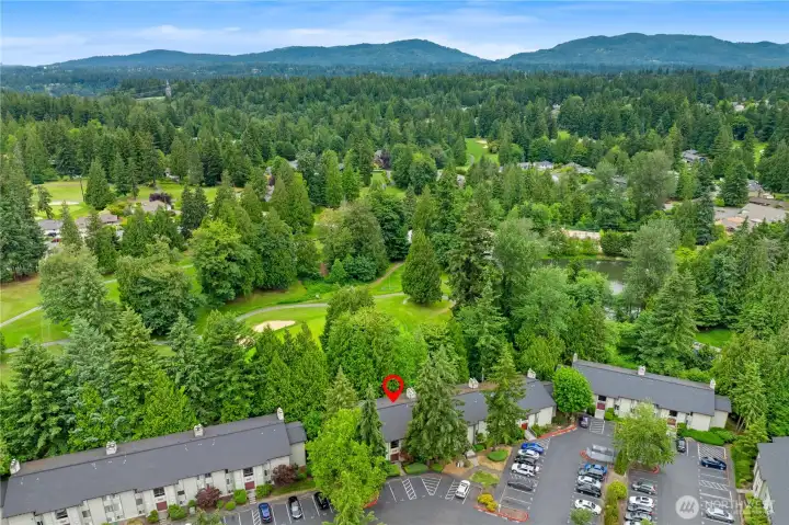 Northeast aerial view of building and golf course