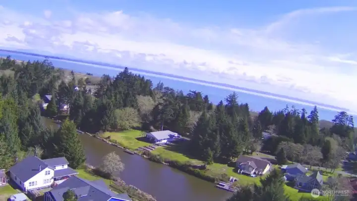 Aerial of Duck lake with Ocean few blocks away