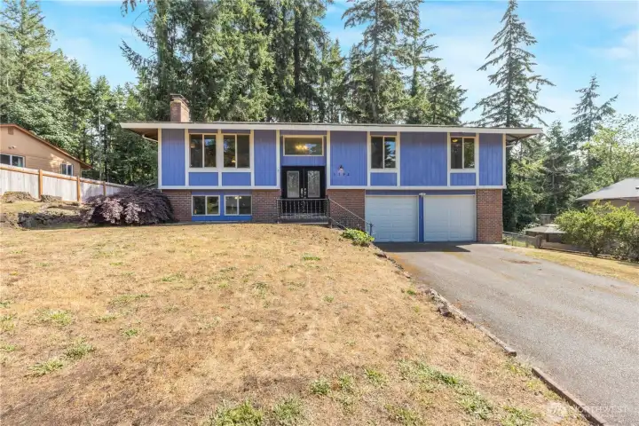 Split-level home with attached 2-car garage.