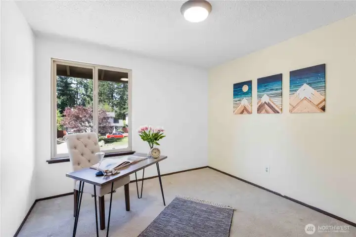 Main level, first bedroom on the right.