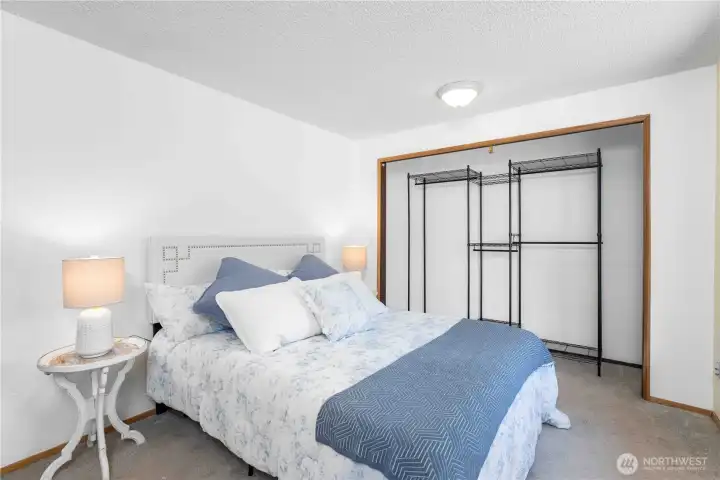 Main level, second bedroom on the right.