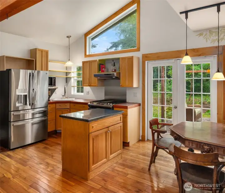 Kitchen has lots of cabinet space and easy access to the dining area. French doors lead to a private patio at the back of the house. Not seen is a walk in pantry. Kitchen has lots of cabinet space and easy access to the dining area. French doors lead to a private patio at the back of the house. Not seen is a walk in pantry.