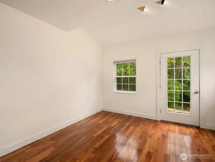 First floor den gets lots of light, perfect for a studio. First floor den gets lots of light, perfect for a studio.